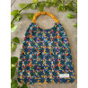 Bavoir maternelle arabesque jaune